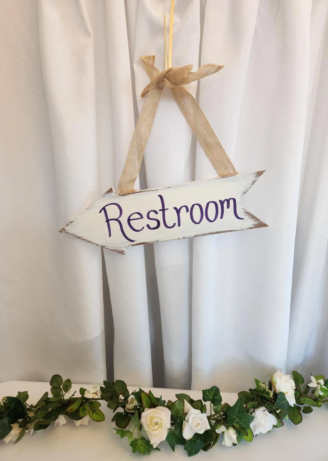 Restroom Sign White Wooden Arrow Hangs