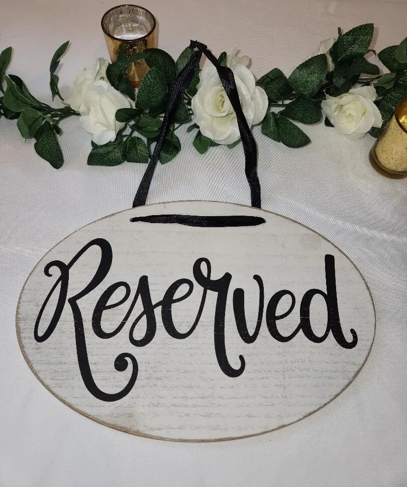 Reserved Wooden White Oval Sign Hangs