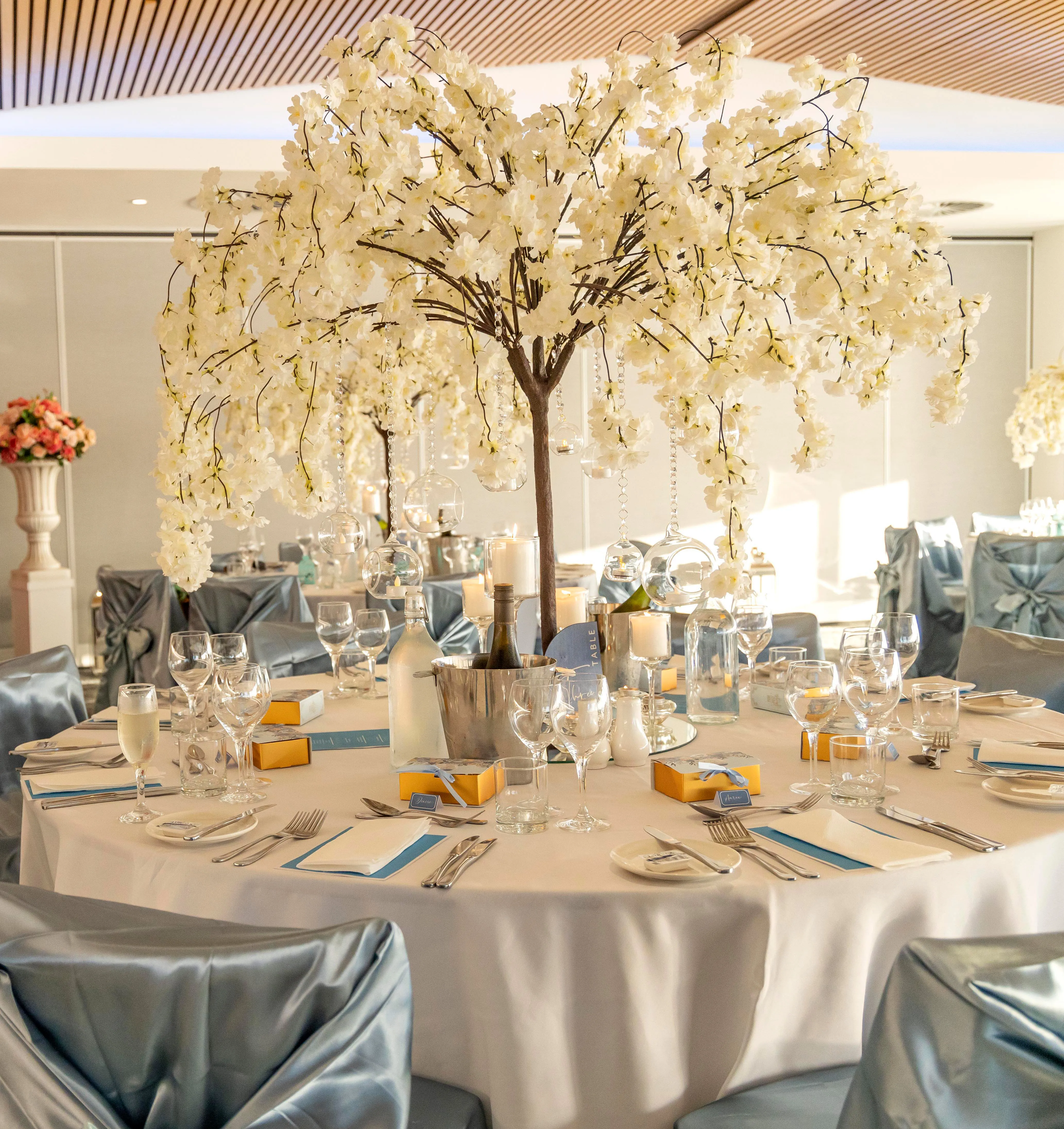 Artificial flower cherry blossom tree decorated with bubble glass hanging tea candle holders 