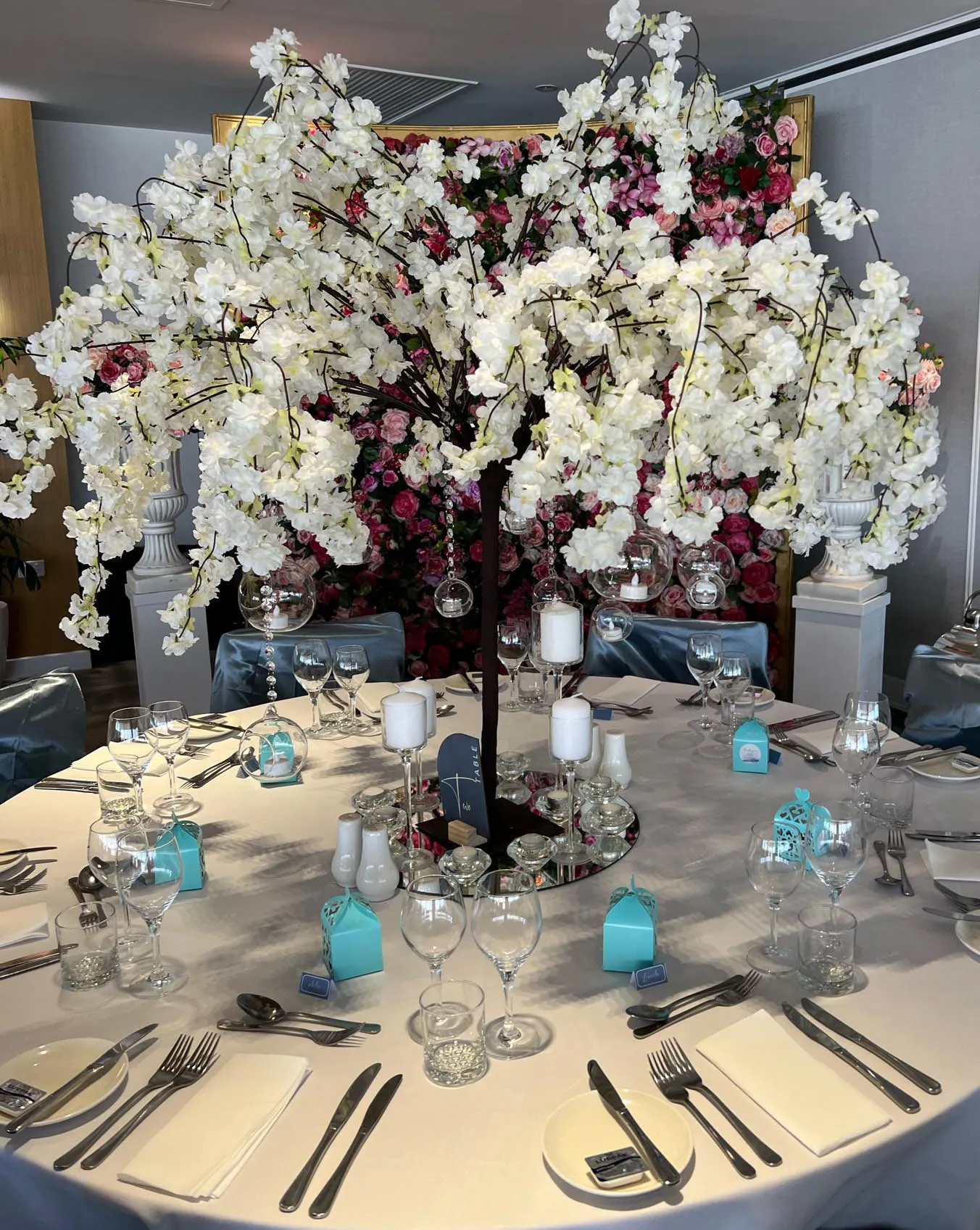 Artificial flower cherry blossom tree decorated with bubble glass hanging tea candle holders 