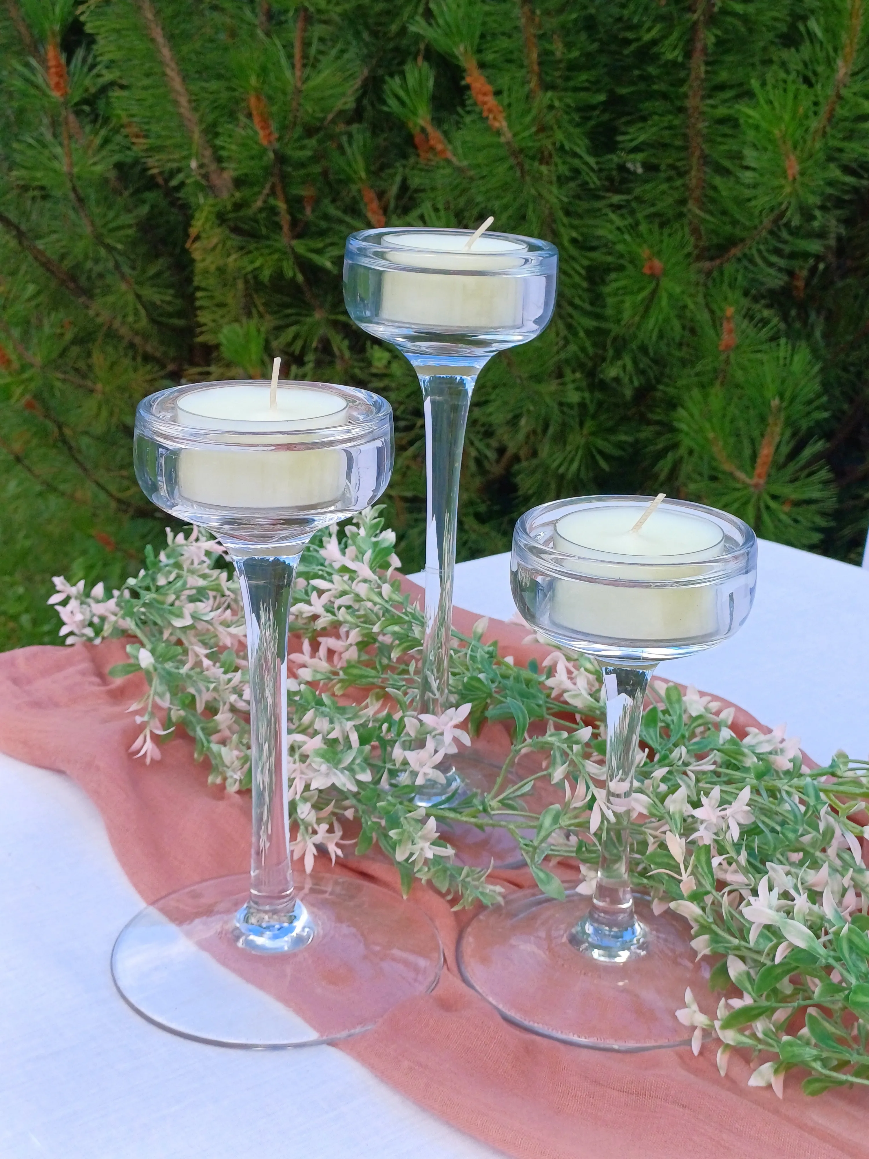 Lasisia kynttilänjalkoja