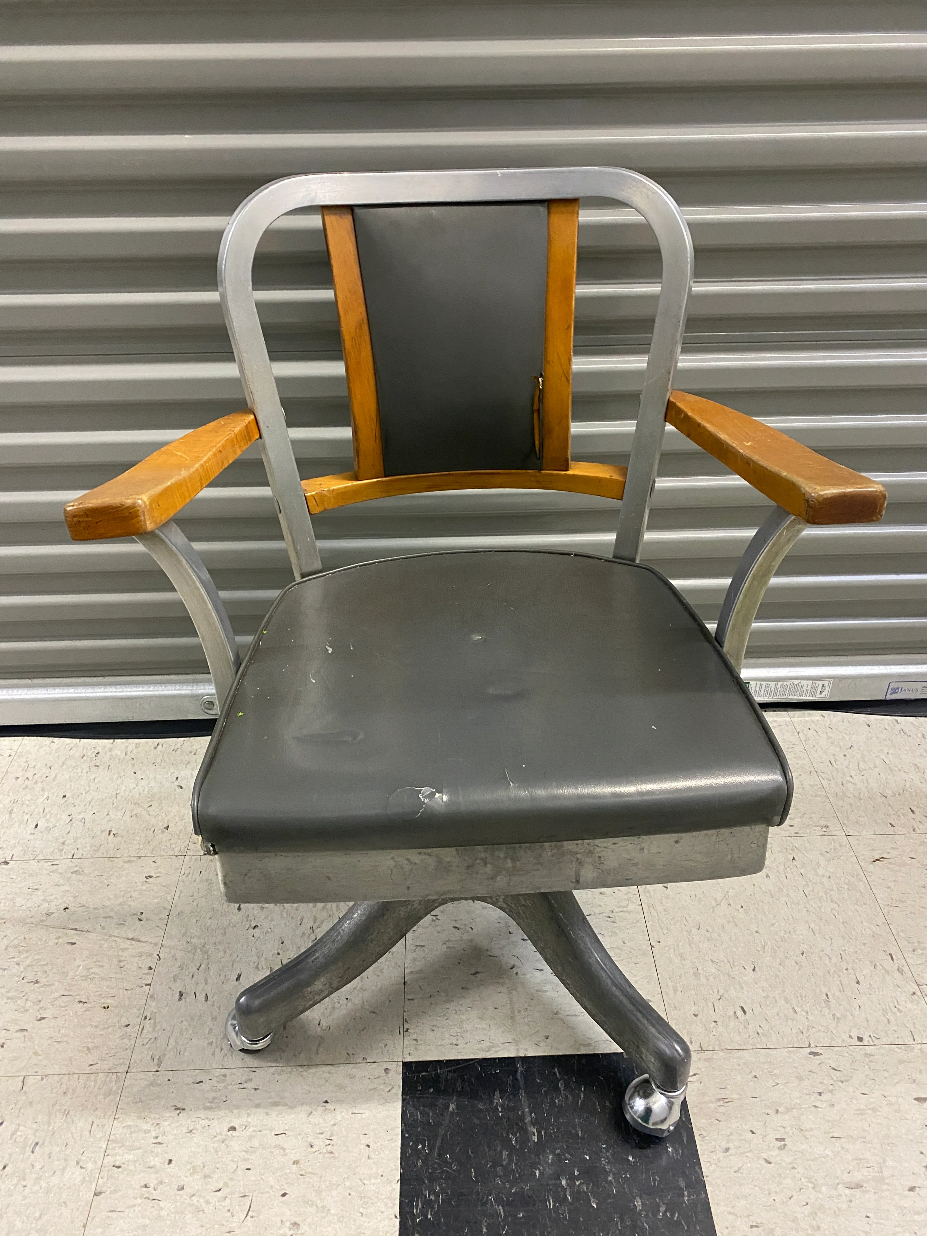 Antique Metal Tanker Rolling Chair