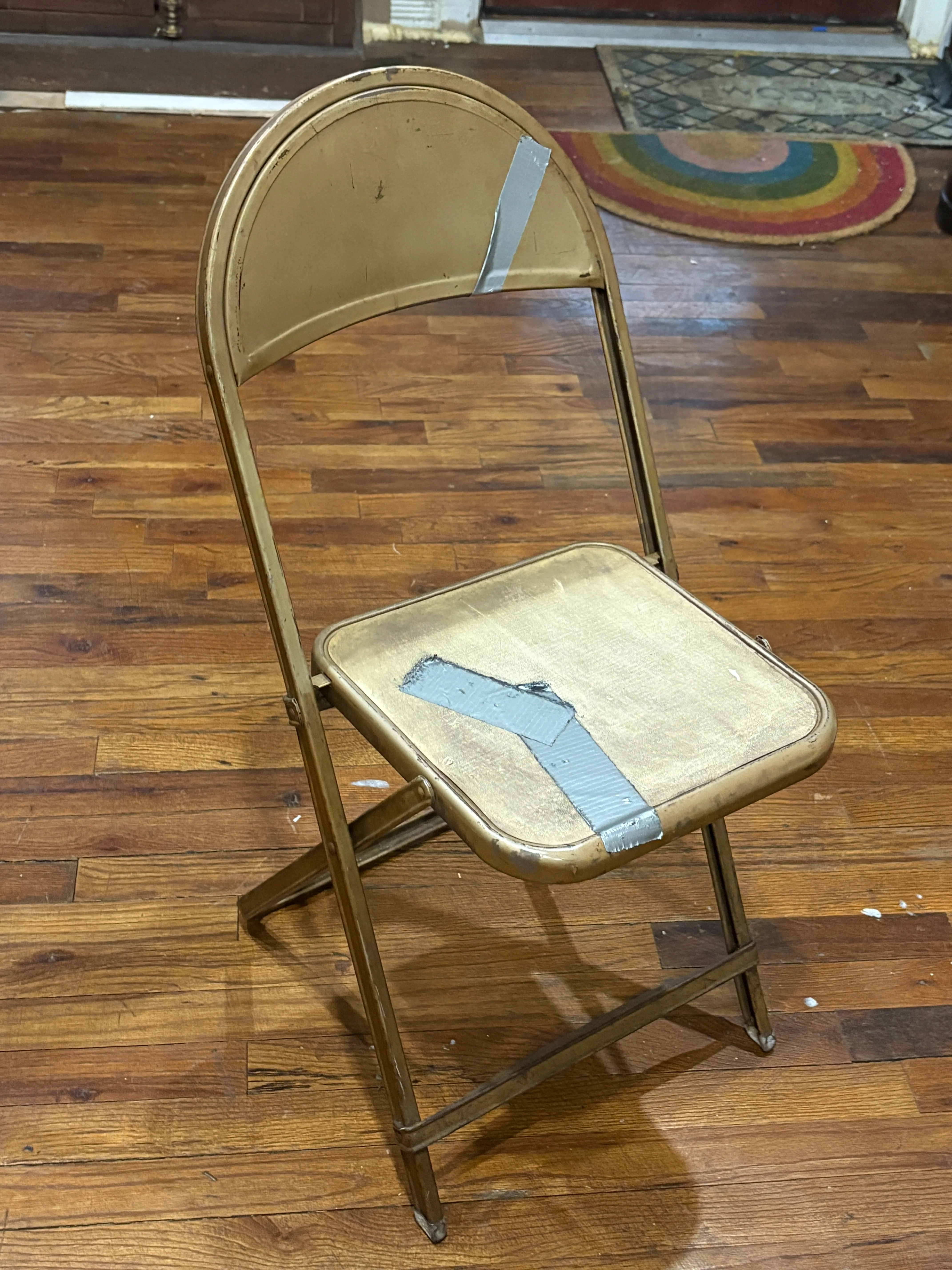 Gold folding chair