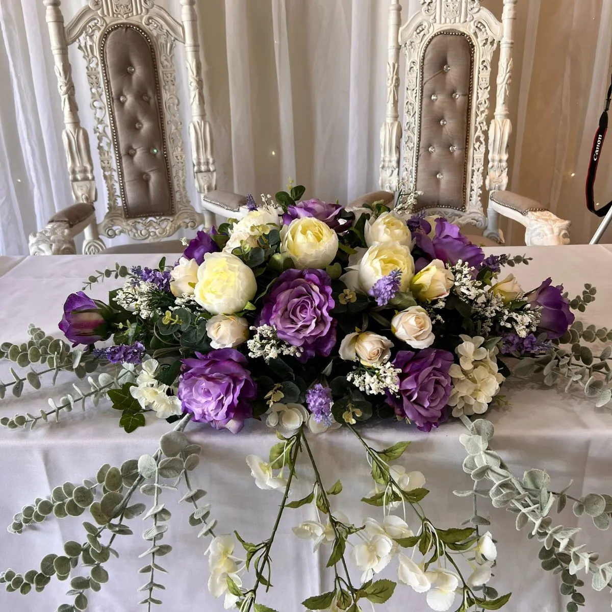 Purple & White Low And Long Flower Arrangment For Hire