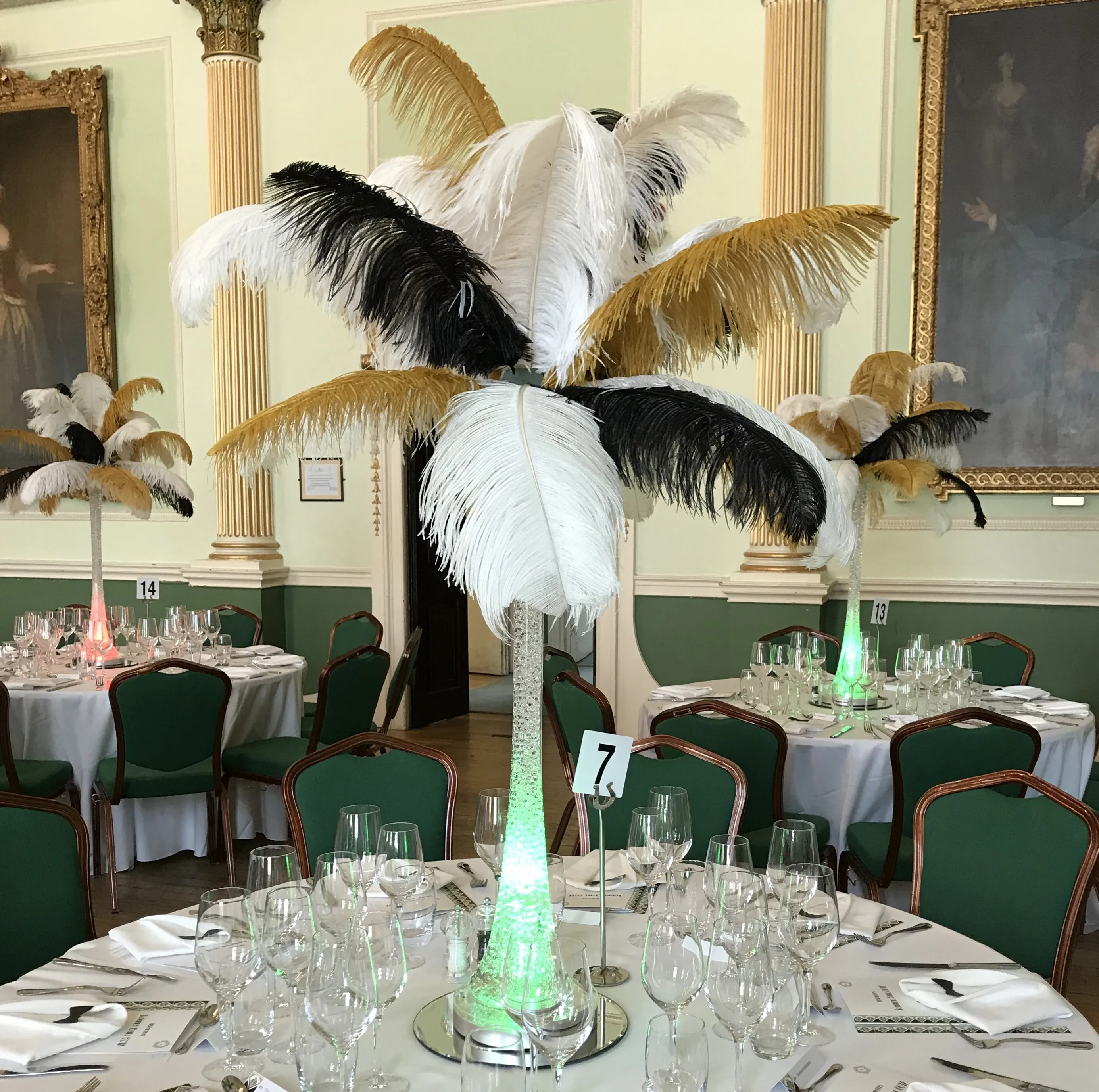 Black, Gold and White Ostrich Feather Centrepieces Hire