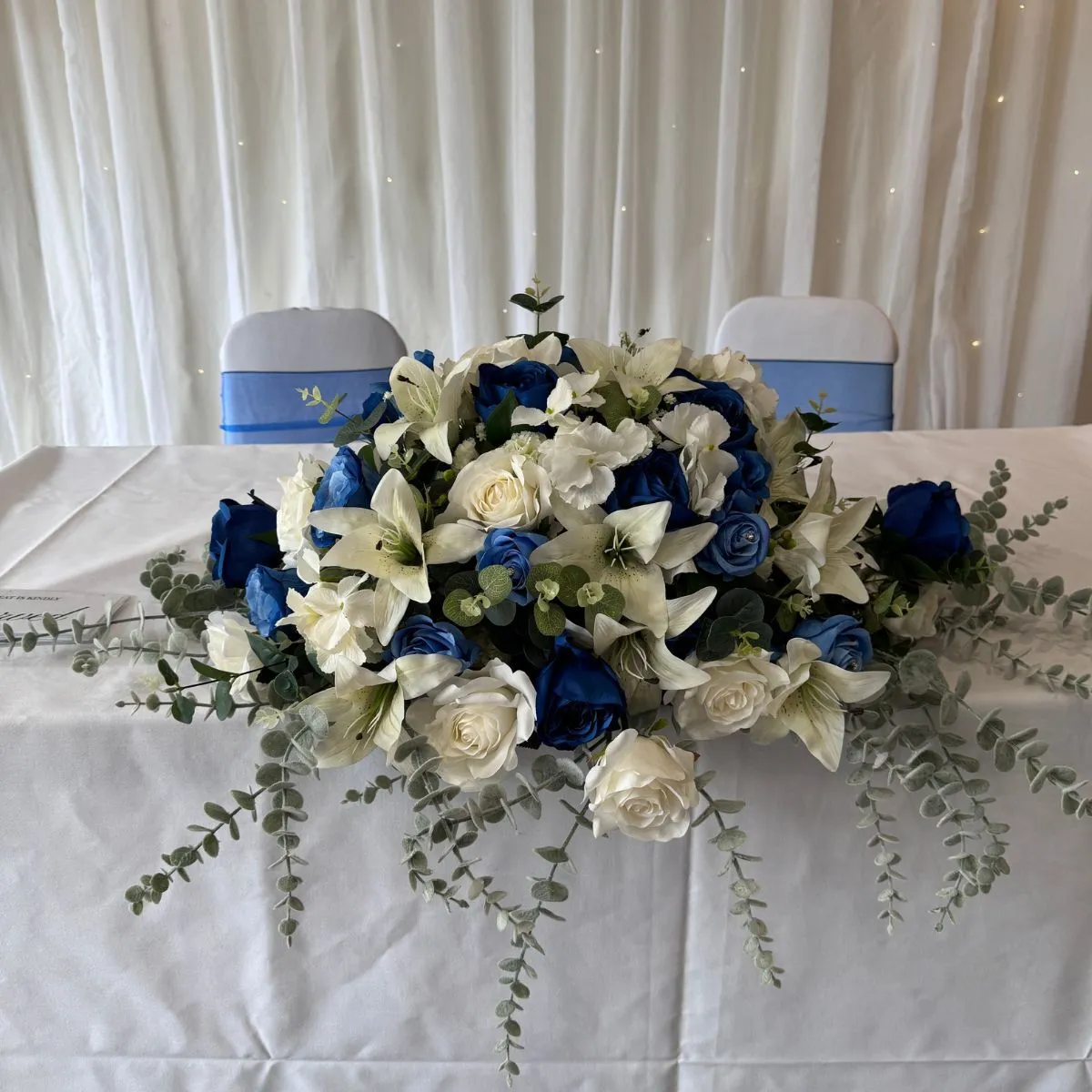 Blue & White Low And Long Flower Arrangement For Hire