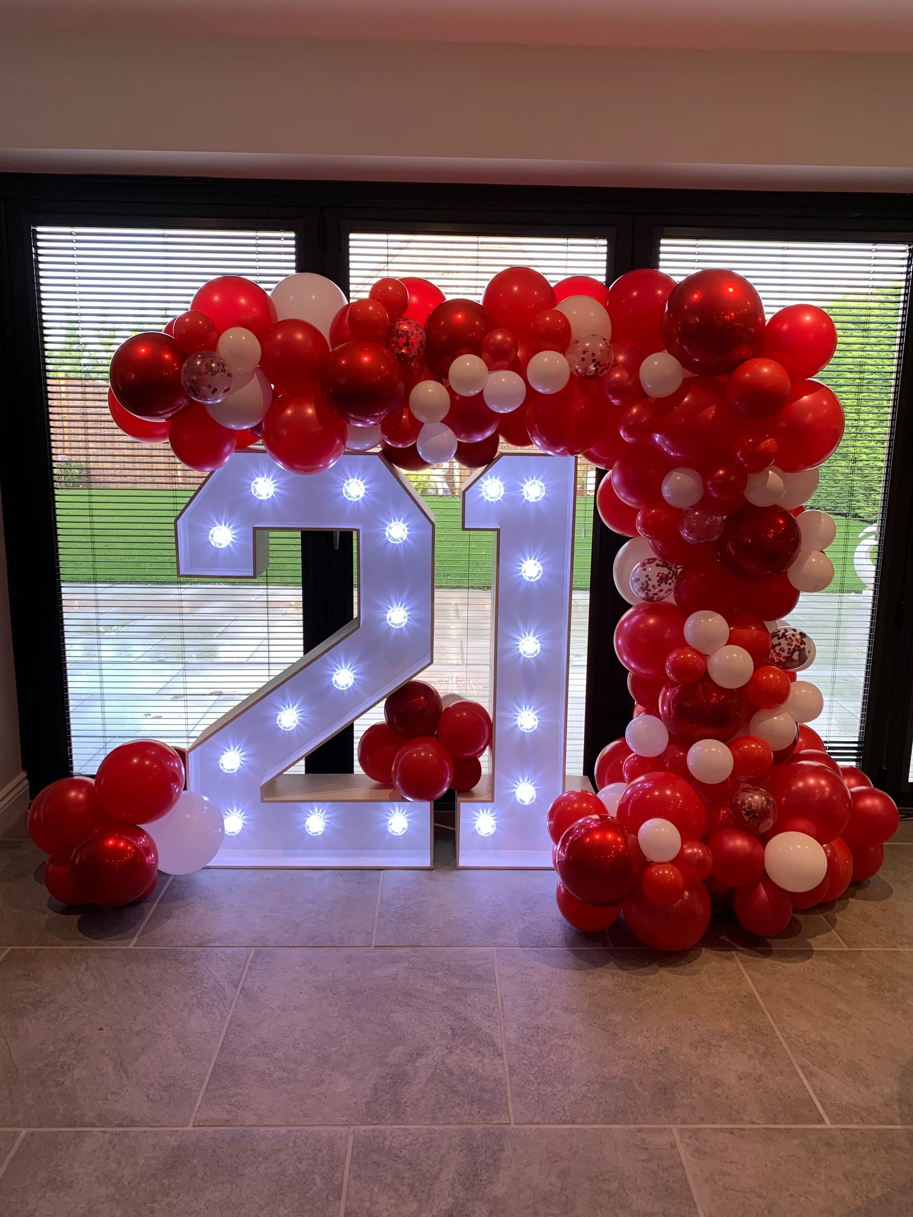 Red & White Demi Balloon Arch with Double Light Up Numbers