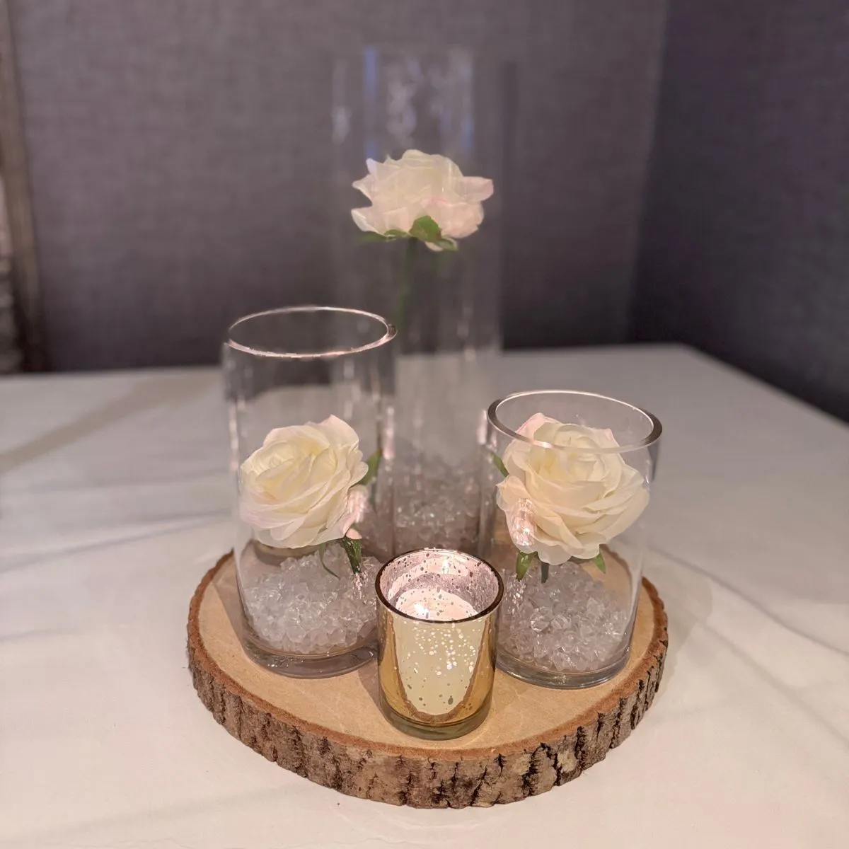 Log, White Rose & Candle Centrepiece For Hire