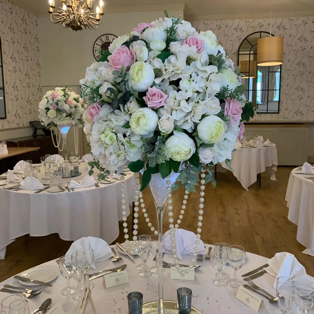 At Enchanted Weddings & Events Bristol we offer bespoke wedding styling, venue décor, prop hire, lighting, draping and luxury wedding decorations tailored to your special day.