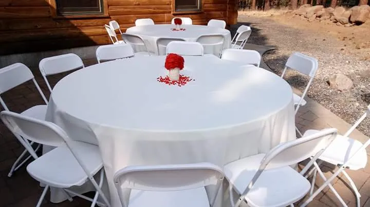 5Ft Round Table W/120" Tablecloth and 8 White Chair Bundle