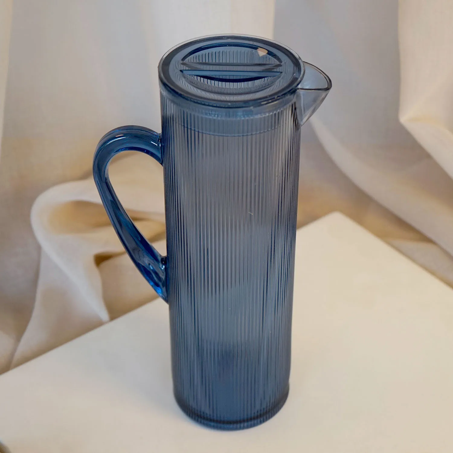 Blue plastic jug