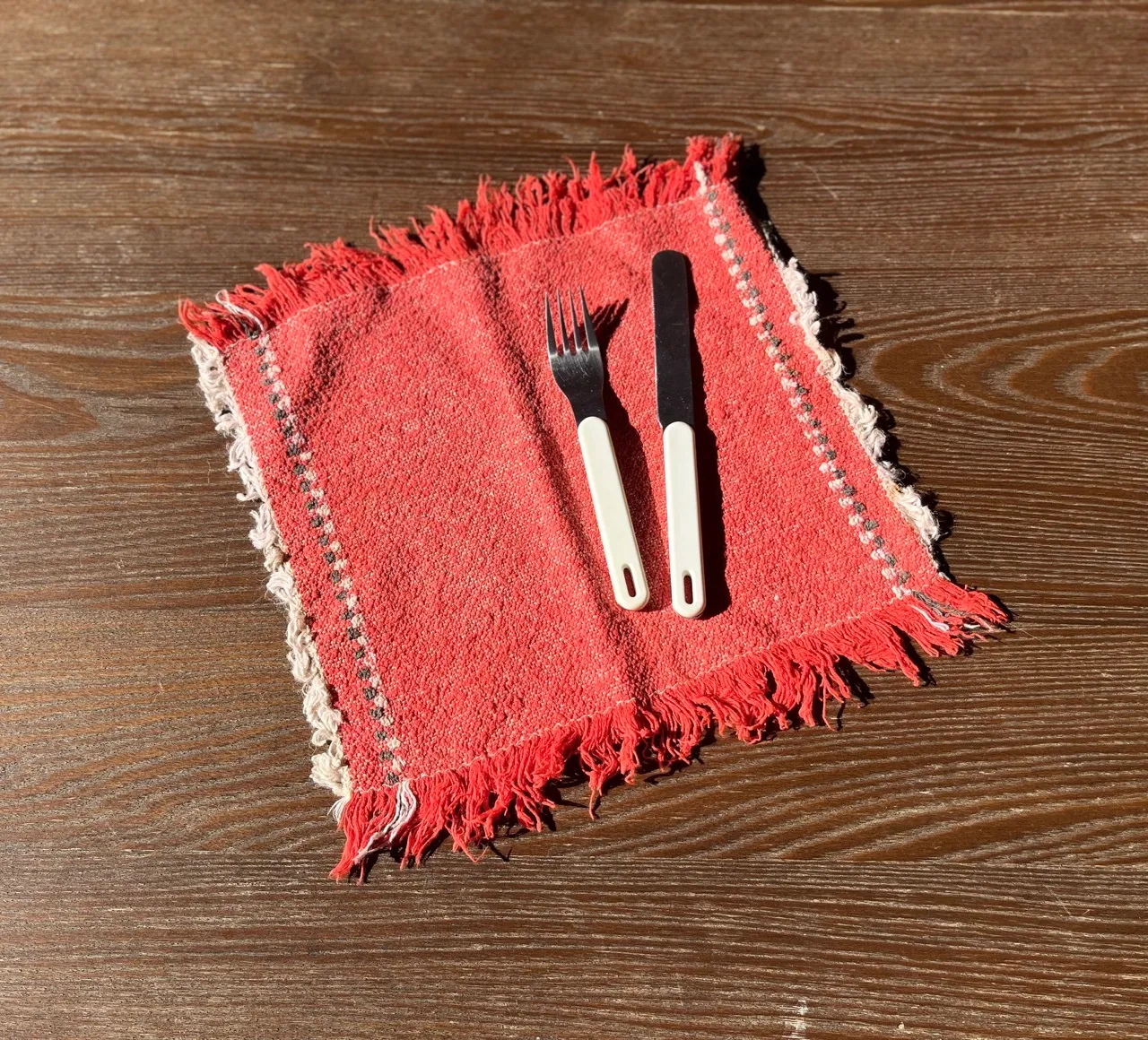 Worn Coral Fringe Napkin