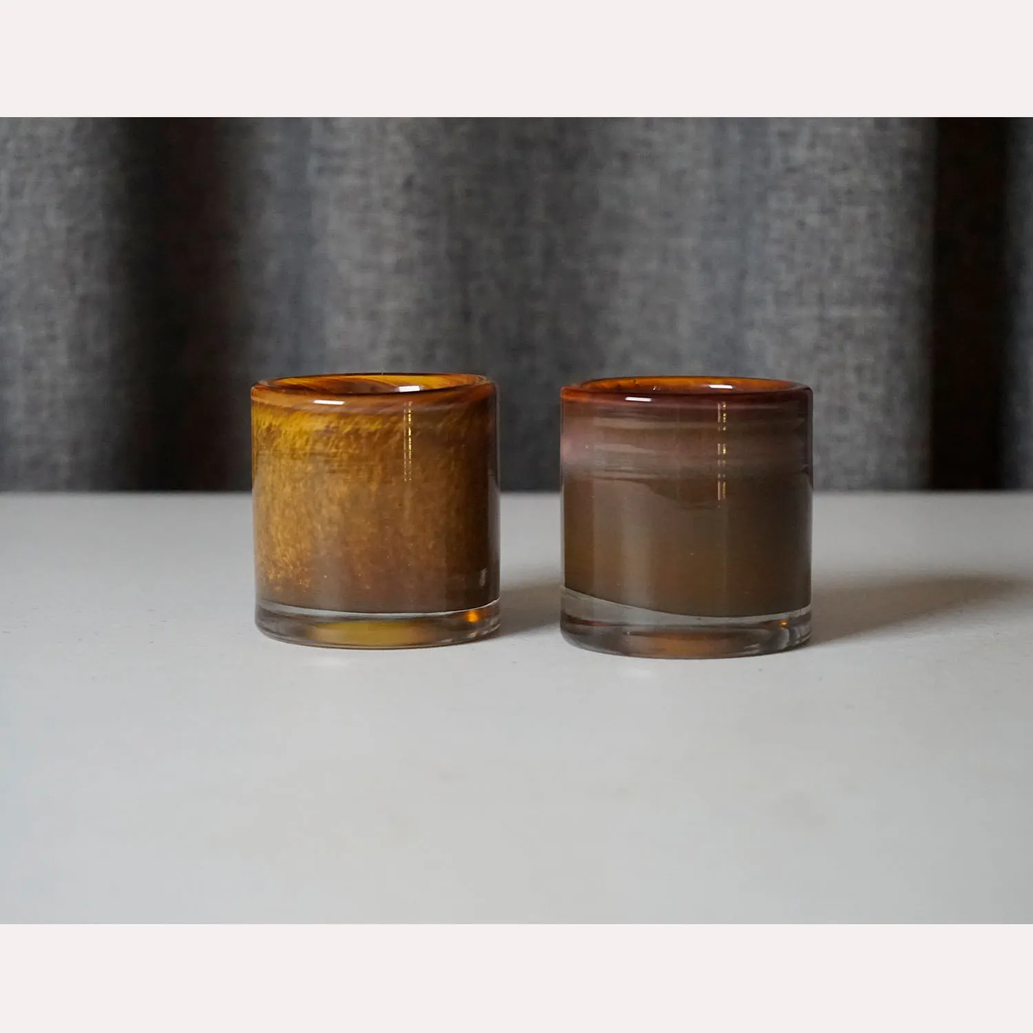 Burnt orange and brown candle holders