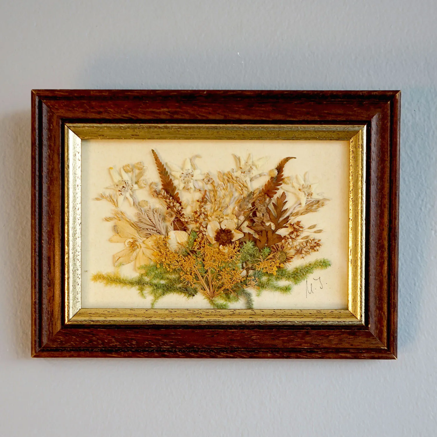Wooden frame with pressed flowers 