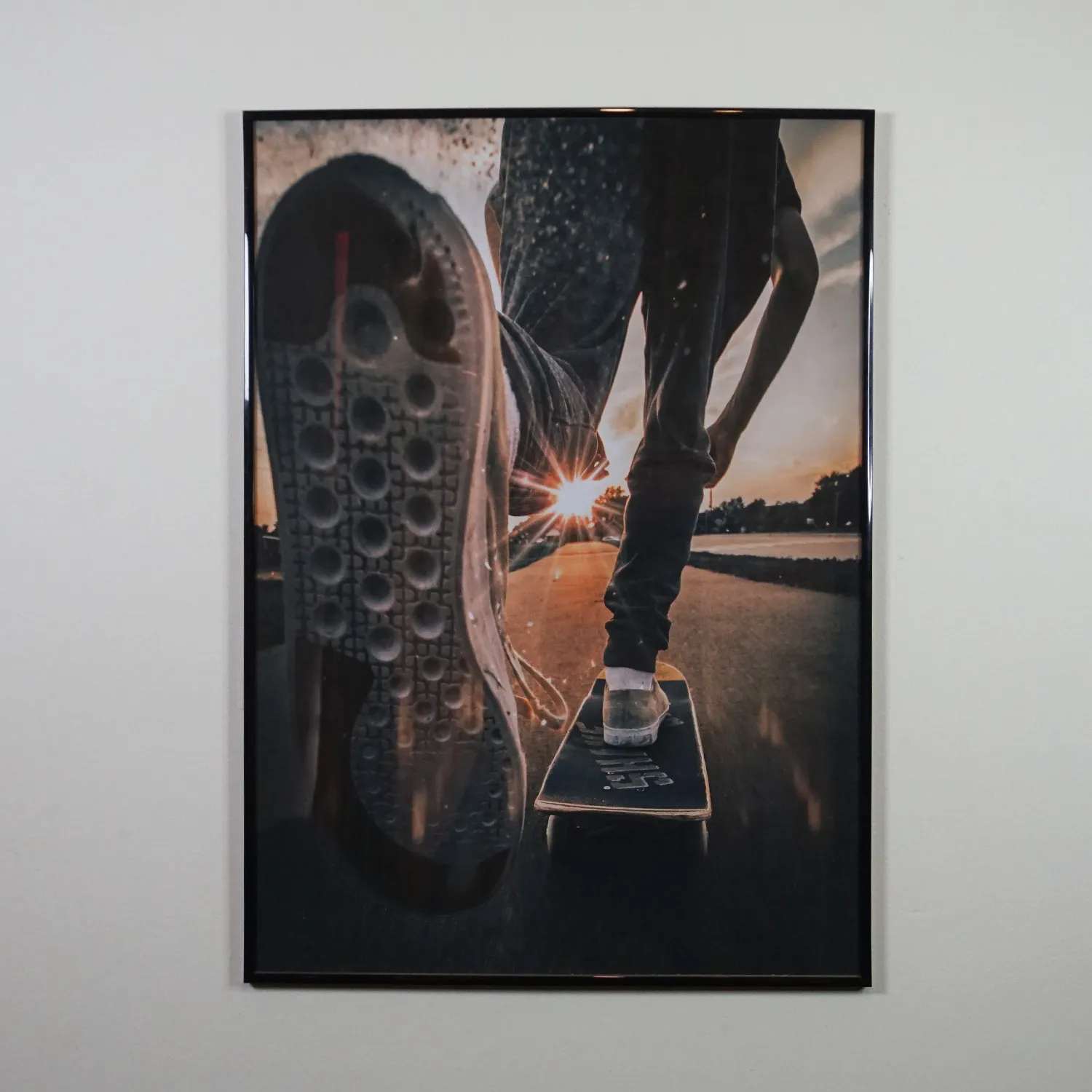 Royalty free images in black metal frame with glass