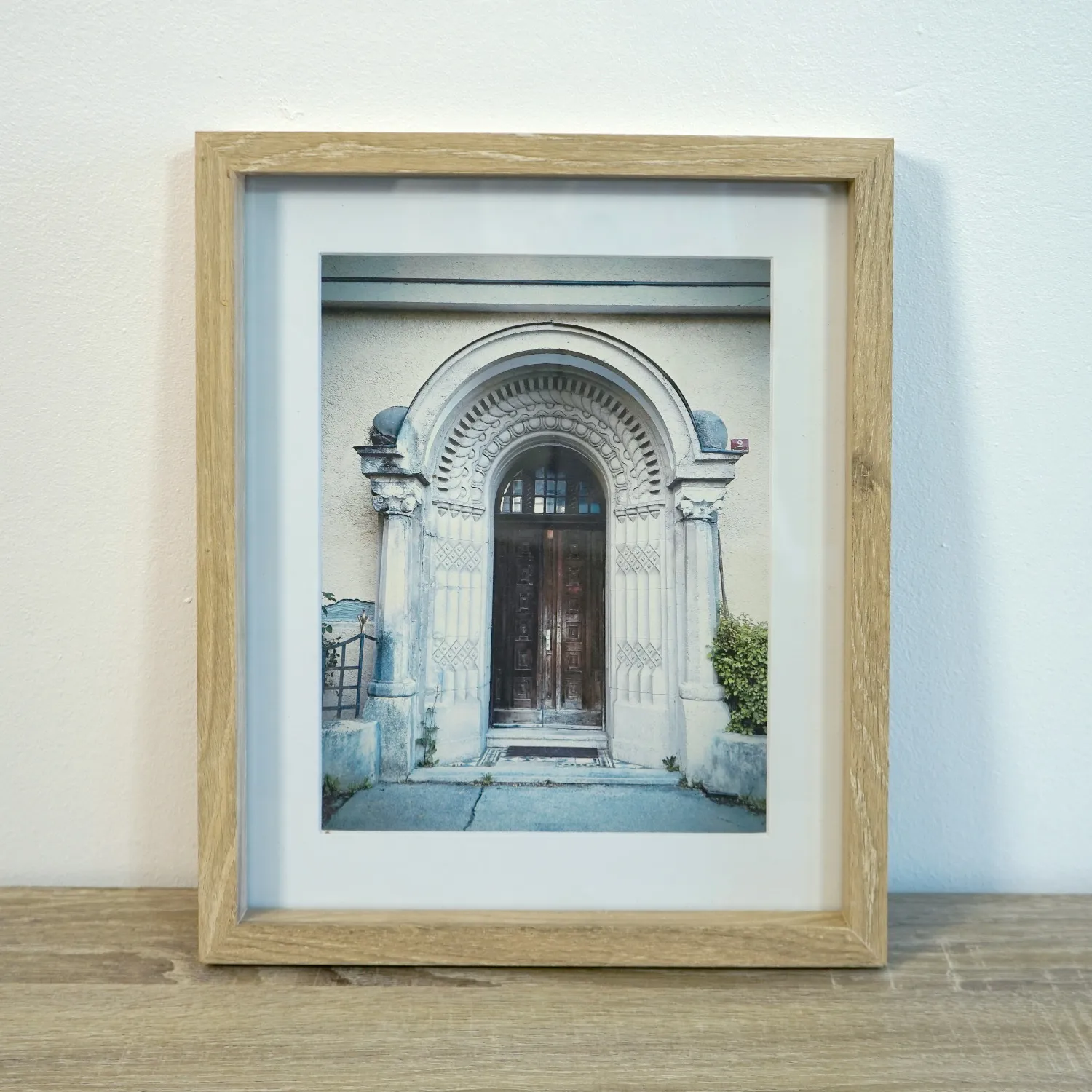 Small Light Wood Frame with Royalty free artwork of a German Door, Glass Cover