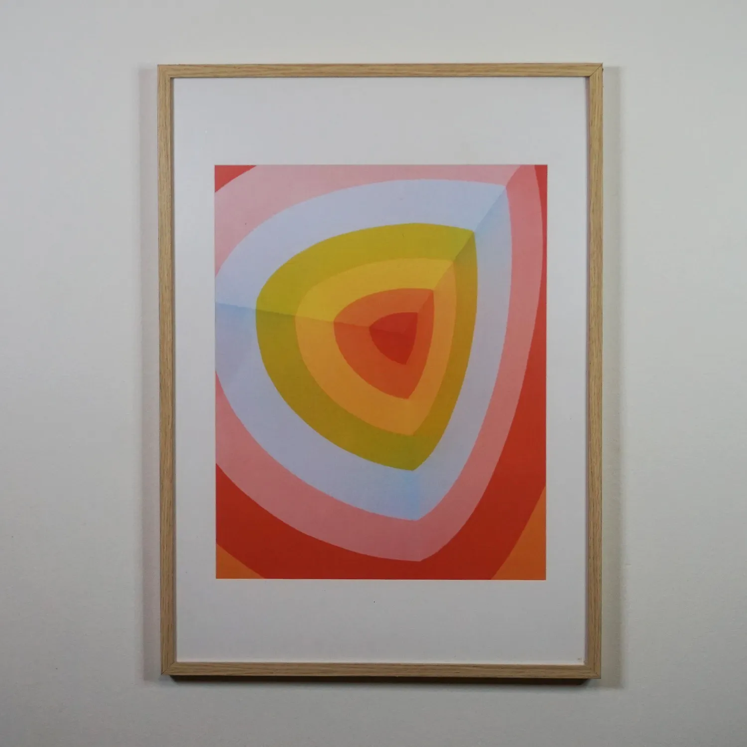 Royalty Free pink abstract print in Light wood and glass frame