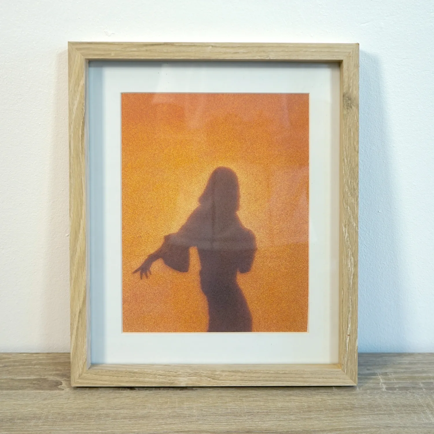 Small Light Wood frame with orange royalty free artwork, glass cover
