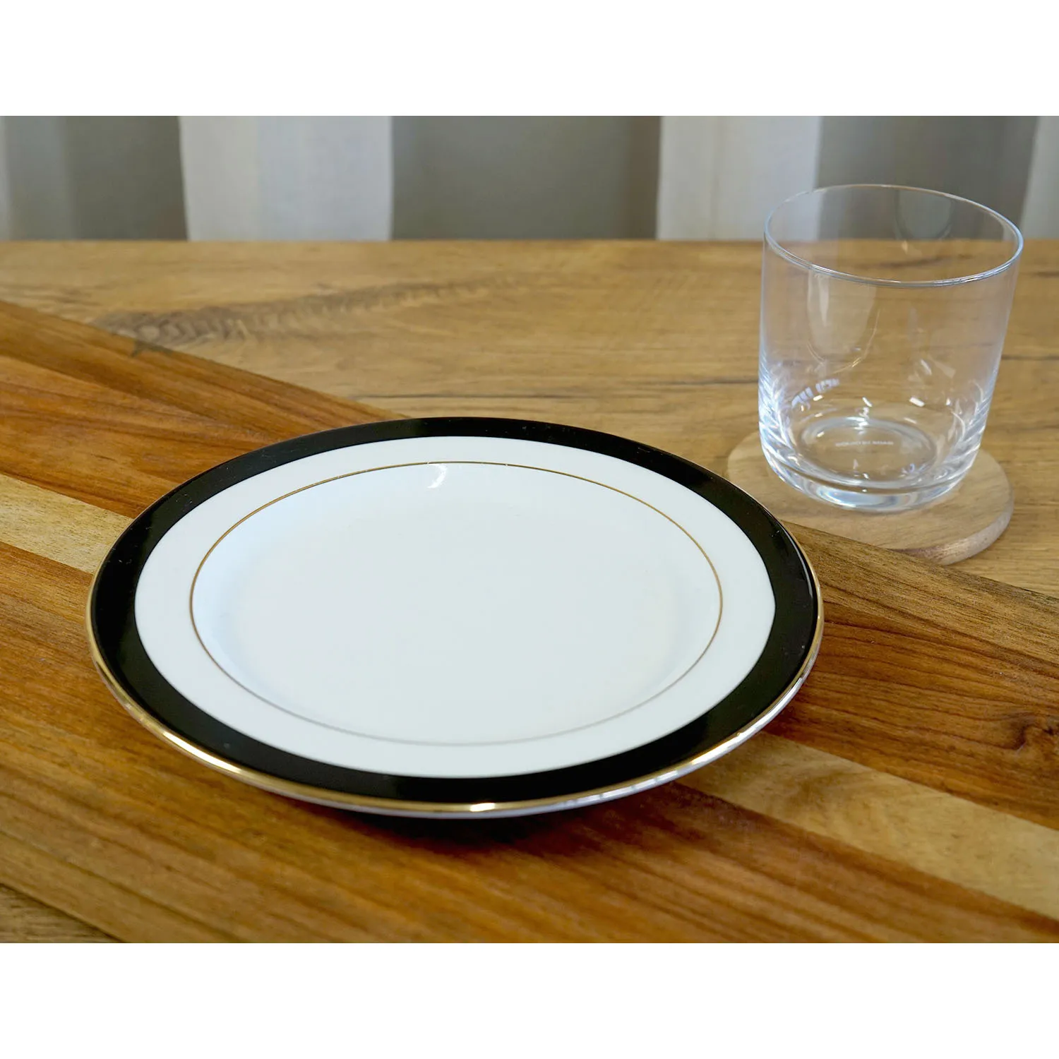 H&M White side plate with Black and Gold Trim