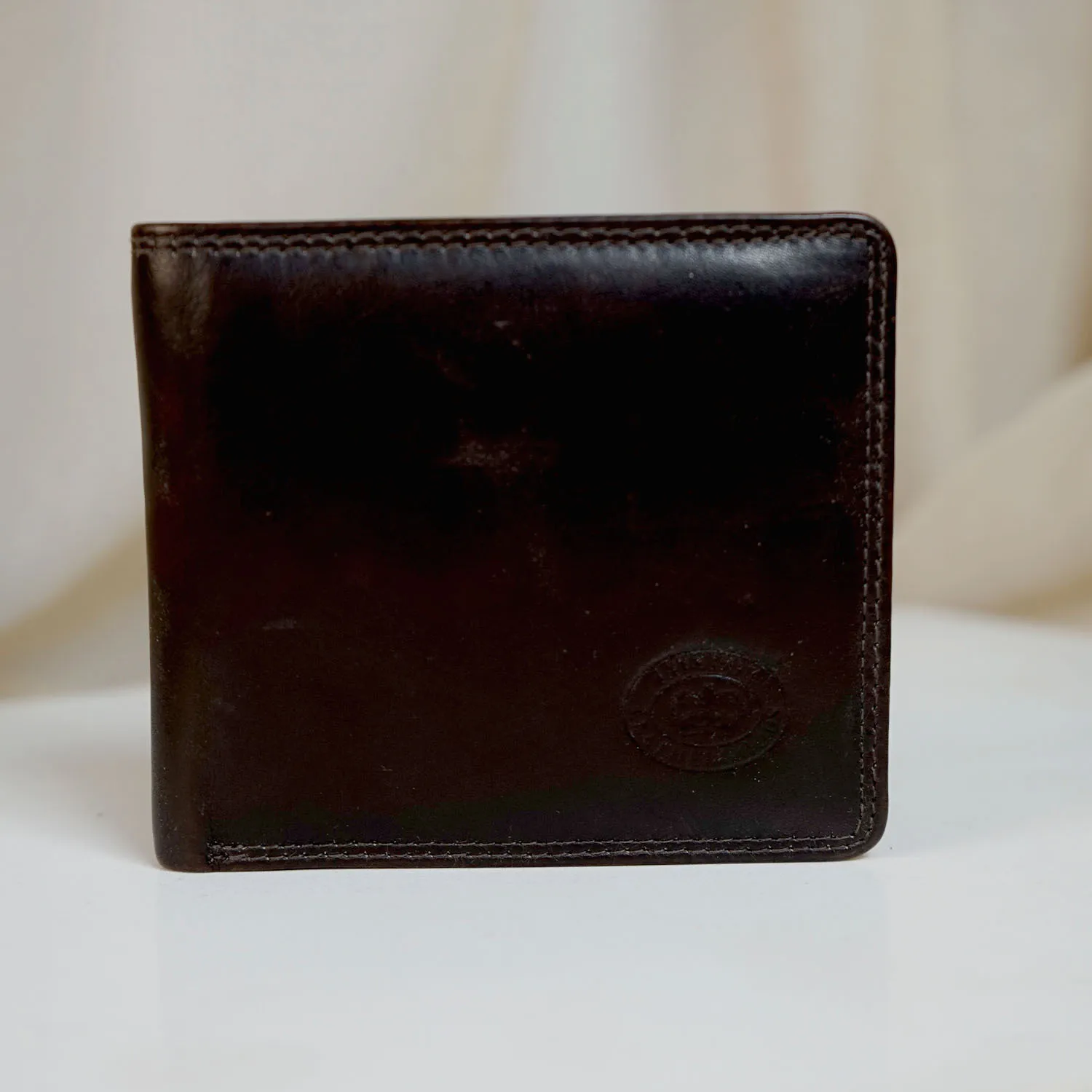 Worn Dark Brown Leather Wallet