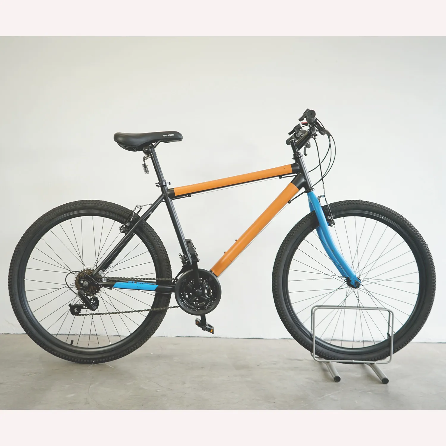 Black and Blue Raleigh Mountain Bike  