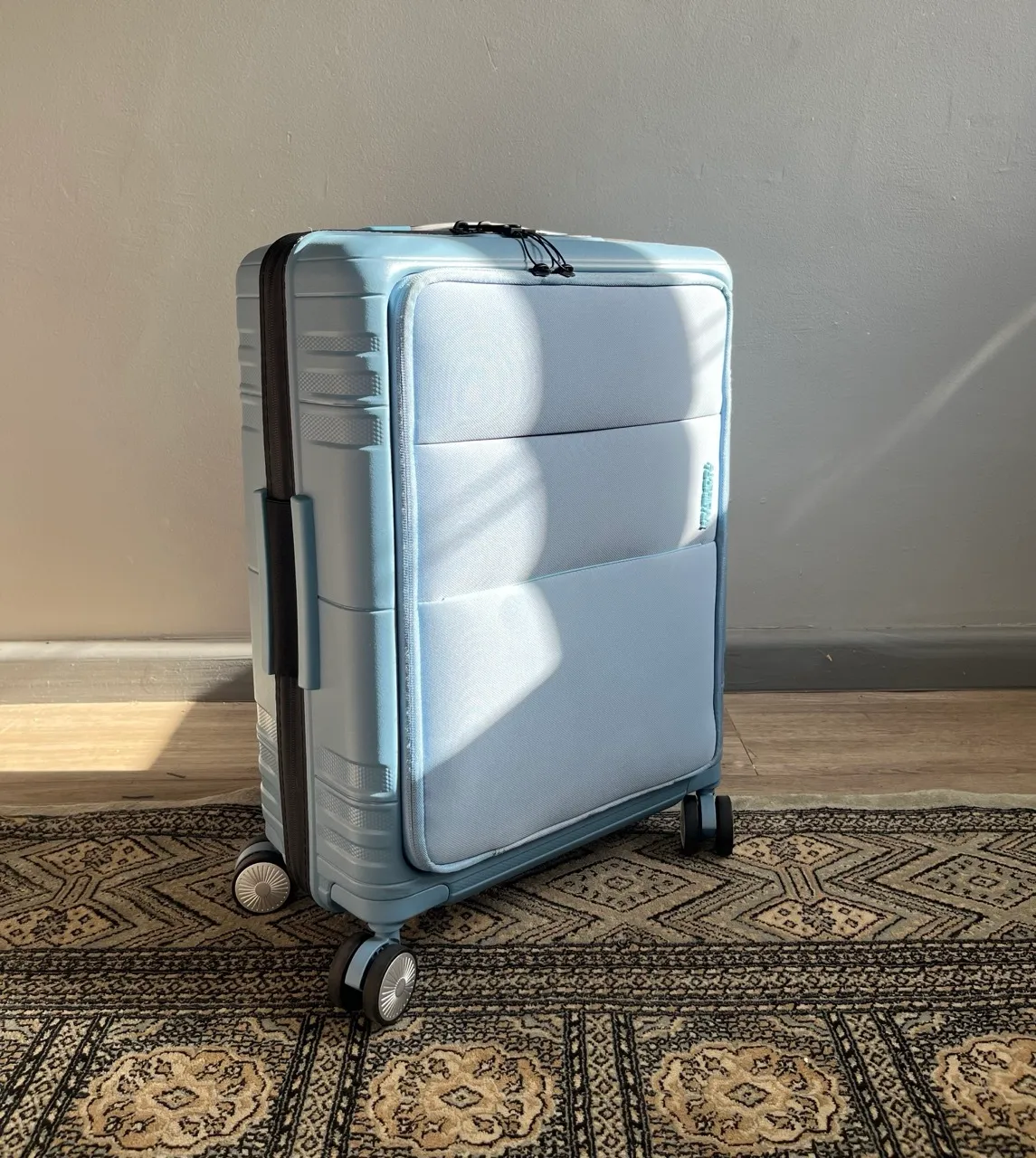Blue American Tourist Carry-On Suitcase.