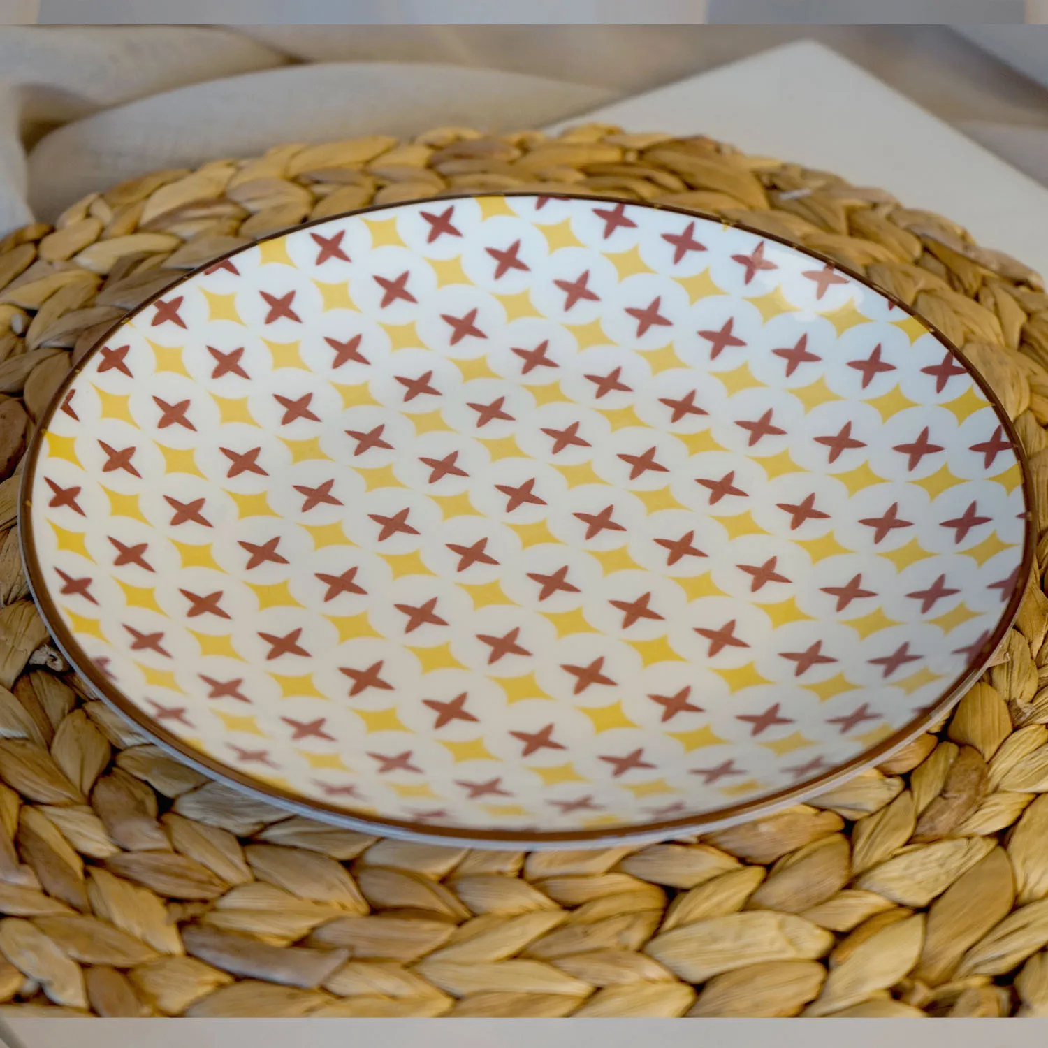 yellow and pink pattern side plate