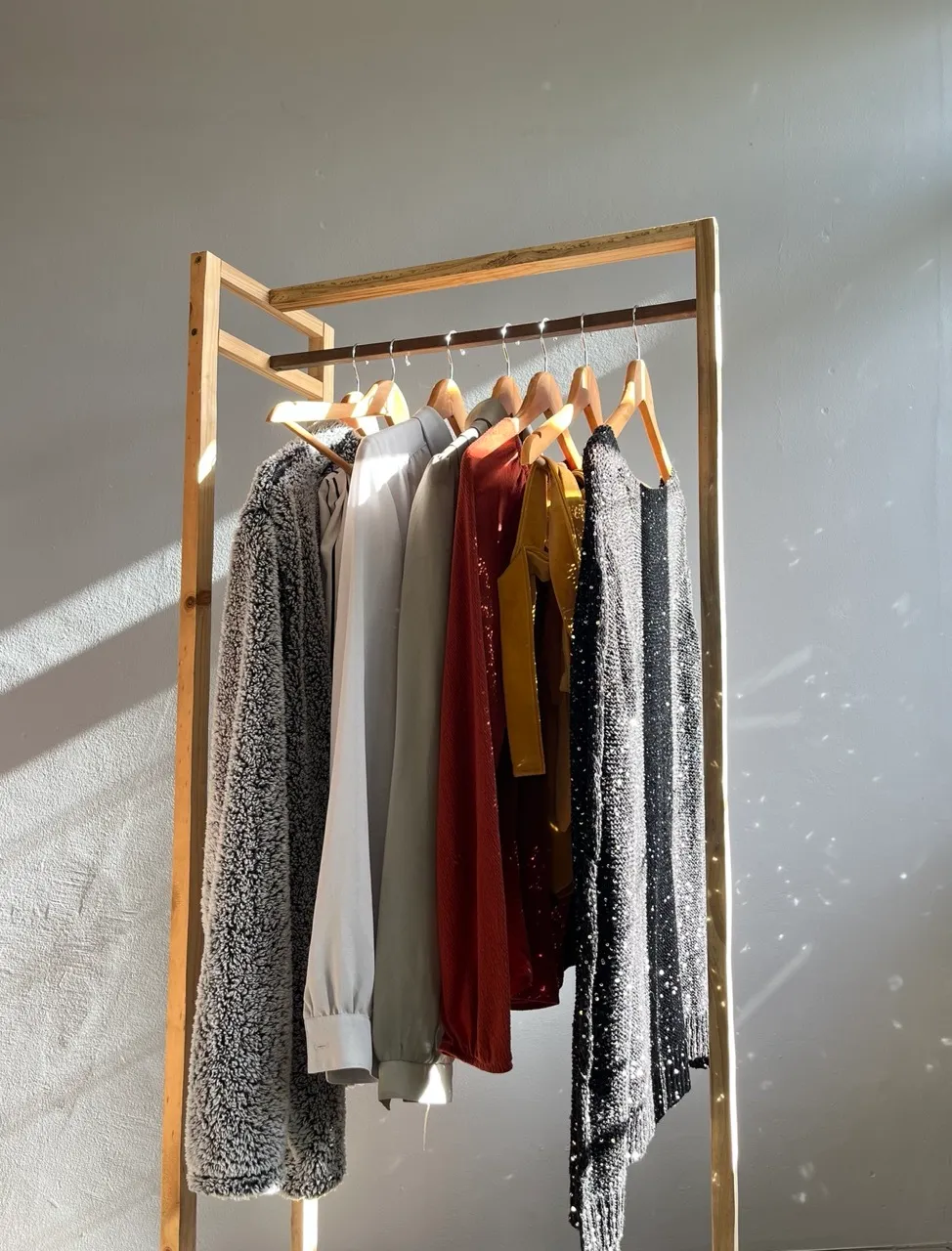 Wooden Garment Rack with Clothing