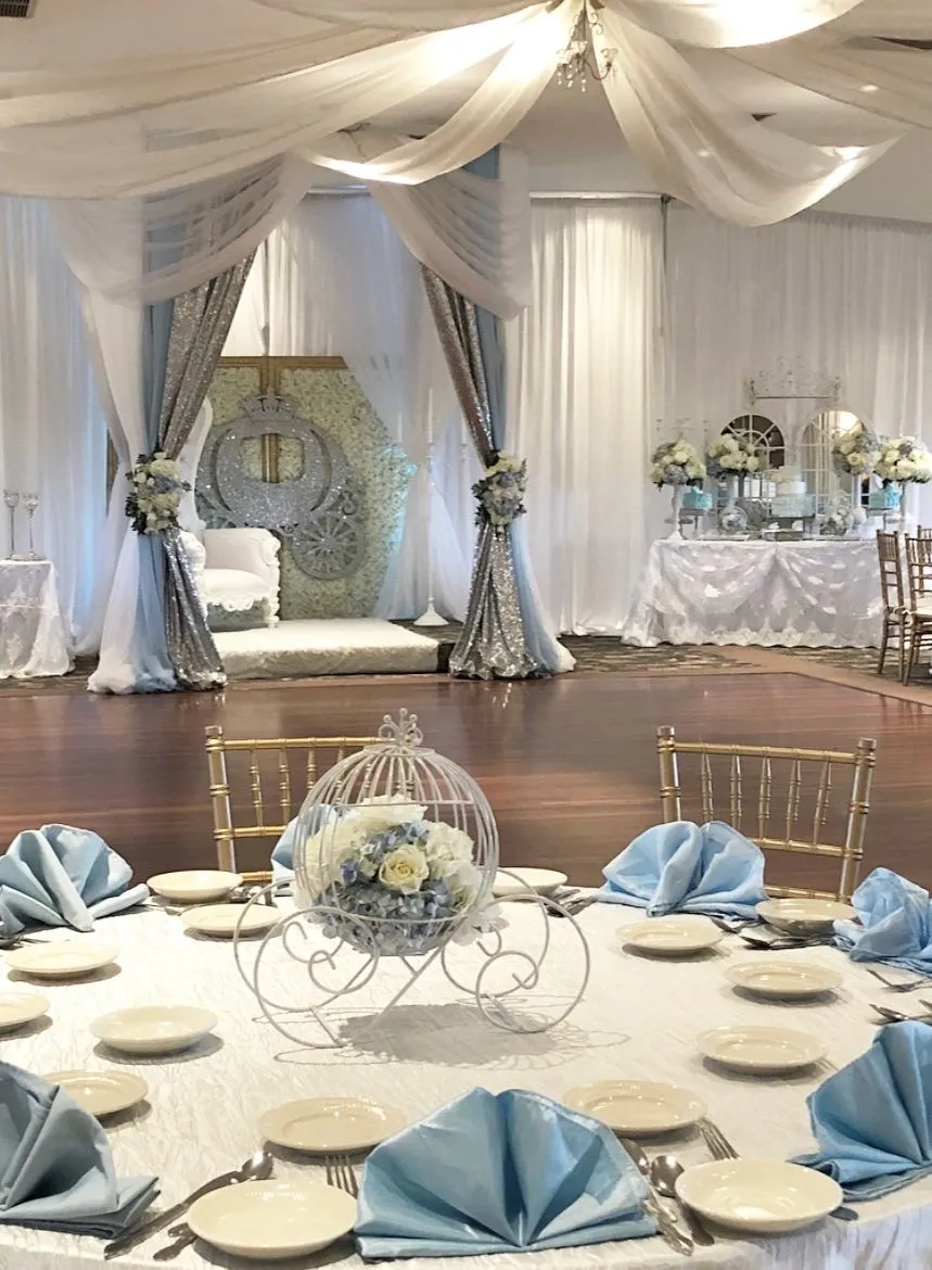 Cinderella carriage centerpieces with flowers 