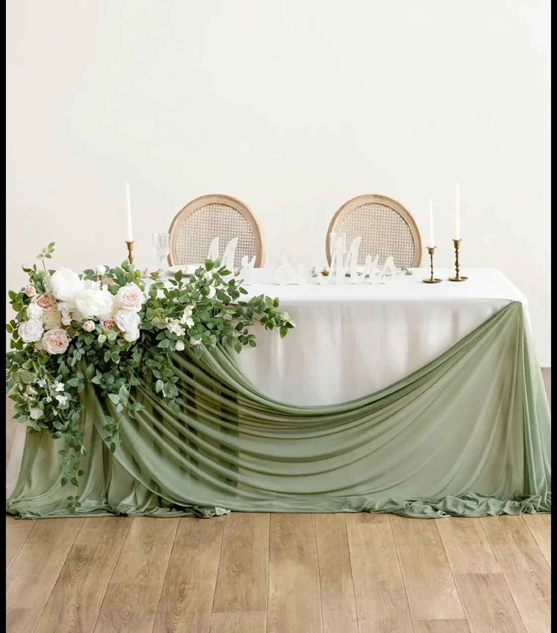Main table- draping with floral details on the side