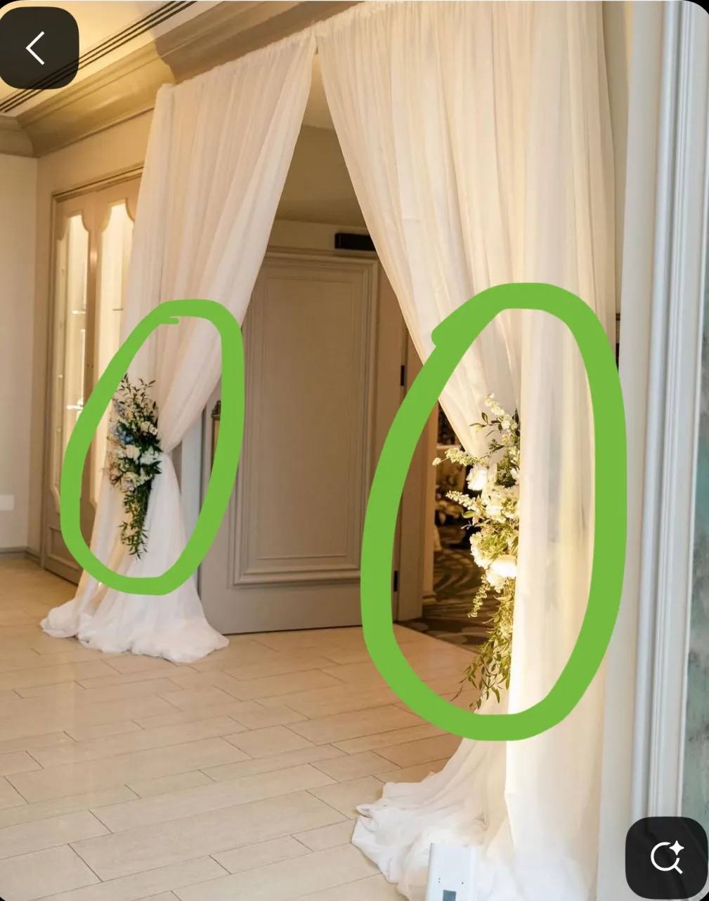 Entrance pipe and drape with floral arrangements 