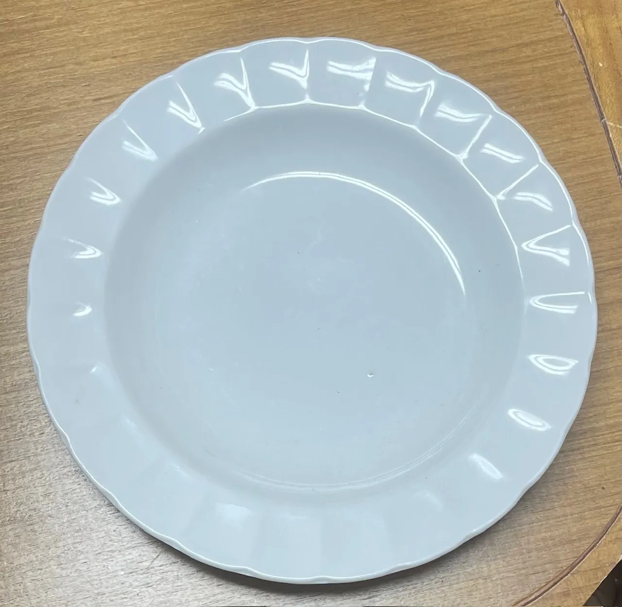 Fluted white salad plate
