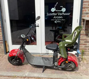 E-scooter met kinderzitje 2 tm 5 jaar