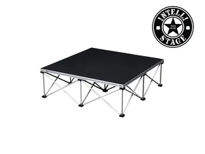 Intellistage grey carpeted stage (1m x 1m) 300mm high with black fabric dress trim and step