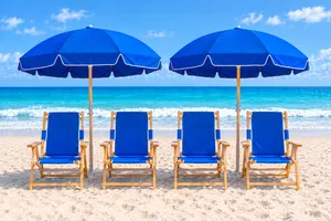 2 umbrellas & 4 Chairs w/ Setup
