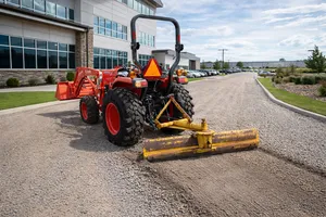 Tractor with 3 point blade