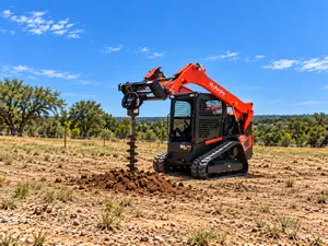  Kubota 75 HP skid steer/bobcat with auger attachment and bit (Open Cab)