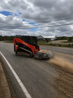  Kubota 65 HP skid steer/bobcat with 72'' sweeper bucket