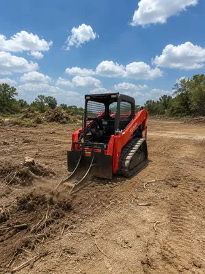  Kubota 65 HP skid steer/bobcat with tree grubber attachment (Open Cab)