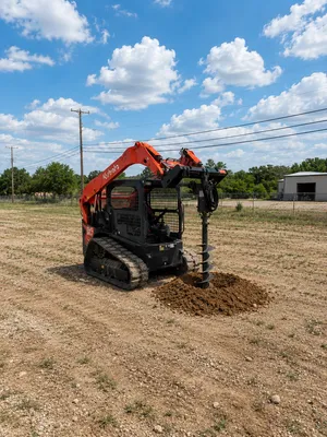 Kubota 65 HP skid steer/bobcat with auger attachment and bit (Open Cab)