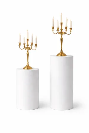 Gold Candelabras on White Pedestals