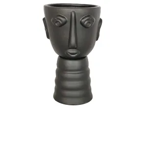 Black Face Vase