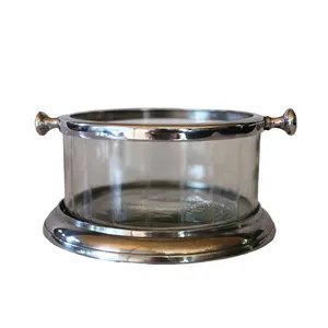 Glass and silver ice bucket