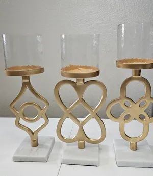 Gold metal glass pillar candle holder with marble base