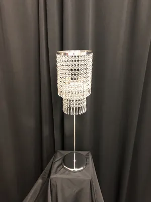 CENTERPIECE: Crystal lamp with silver base 27.75