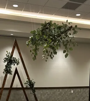 FLORAL: Stained wood ladder with eucalyptus