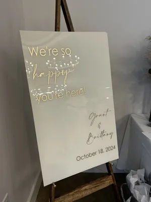 SIGN (Acrylic-cream): We're so happy you're here! (gold lettering) 20