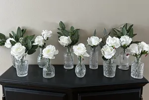 VASES: Clear glass bud (assorted heights & shapes)