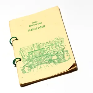 Our Favorite Recipes Off White yellow with Green illustration and text - 8.5
