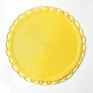 bright baby yellow round woven wicker placemat with braided scalloped edge